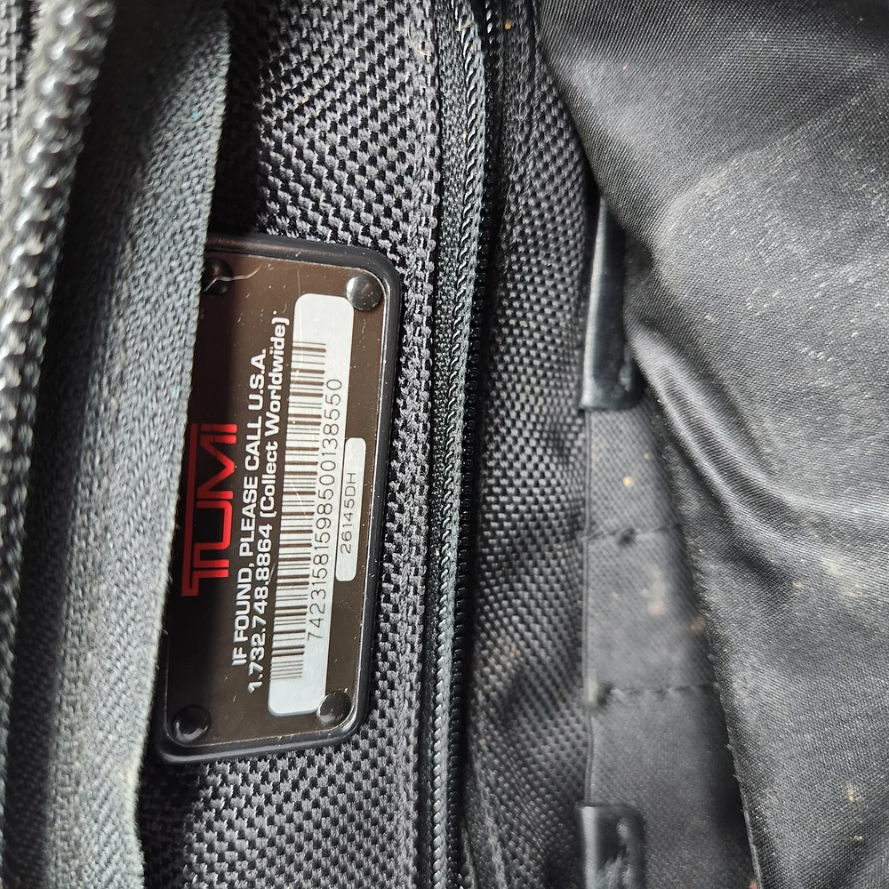 TUMI Black Briefcase with Durable Design
